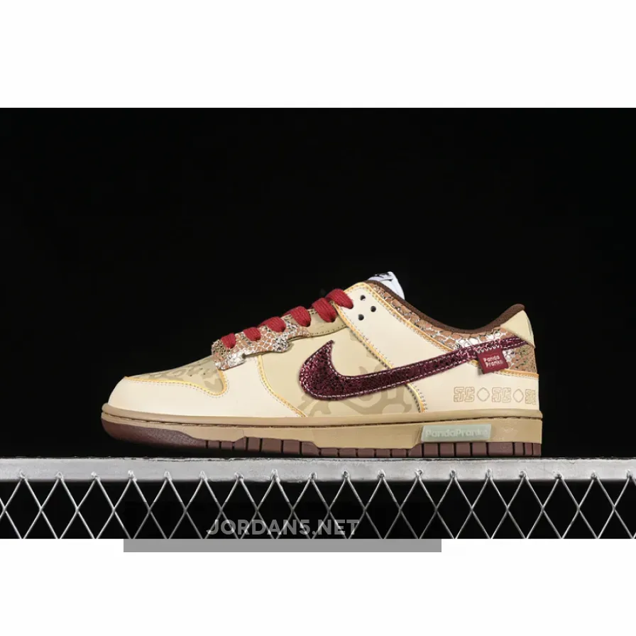 SB DUNK LOW SURFACES IN BROWN AND SAIL SAIL/CACAO WOW/COCONUT MILK/RED
