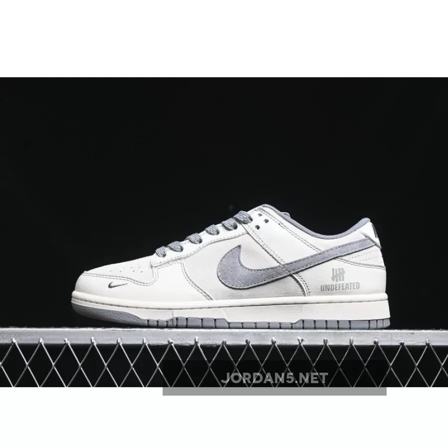 SB DUNK LOW UN WHITE/GREY